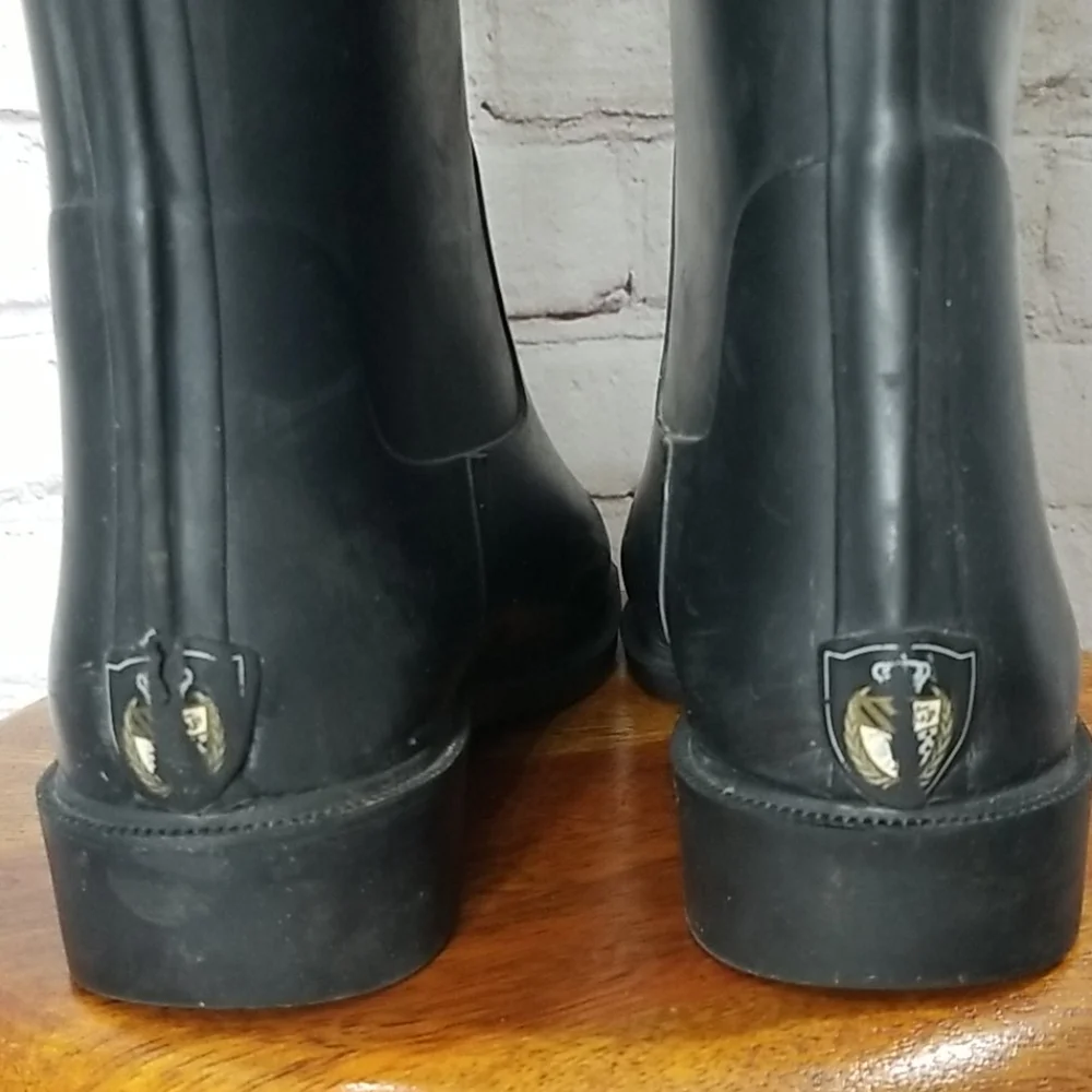Juicy Couture Black Crest Rubber Tassel Riding Boots